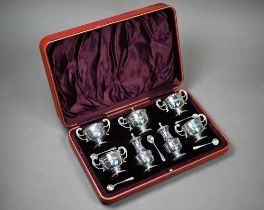 An Edwardian cased silver seven-piece condiment set with spoons, William Mammatt & Son, Sheffield