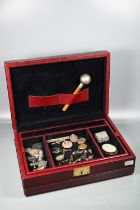 A burgundy jewel case with lift out tray with a quantity of antique and later jewellery including