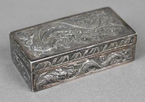 A Chinese export silver snuff box, richly embossed and chased with dragons and pearls, Wang Hing &