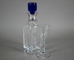 An Atlantis (Portugal) cut glass square decanter with blue glass stopper and silver collar, Broadway