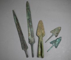 A Bronze Age dagger blade with shallow diamond section, 25 cm and a plainer 29 cm example, to/w a