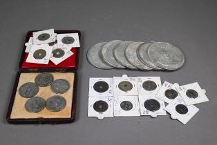 A small collection of antique Chinese cash coins and later commemorative coins including