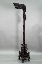 An early 20th century Chinese carved hardwood dragon design lamp/lantern stand, 180 cm high