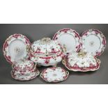 An extensive set of early 19th century china dinnerware (possibly New Hall), decorated with puce,