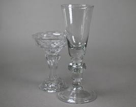 A 19th Century pressed dessert glass with scale design on tapering octagonal stem and domed foot