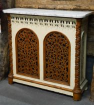 A Victorian Puginesque style cast iron radiator cover, with lobed corner veined white marble top,