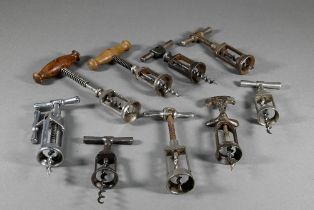Nine various antique open-barrel corkscrews - one with rack and pinion action