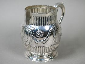 A silver mug of Georgian origin, 11.8oz (a/f) Later added spout removed