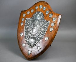 A large oak shooting trophy shield with silver mounts, William Adams, Birmingham 1922, 55 x 41cm,