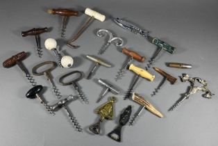 Four Victorian corkscrews with turned wood handles, to/w three 19th century metal corkscrews and a