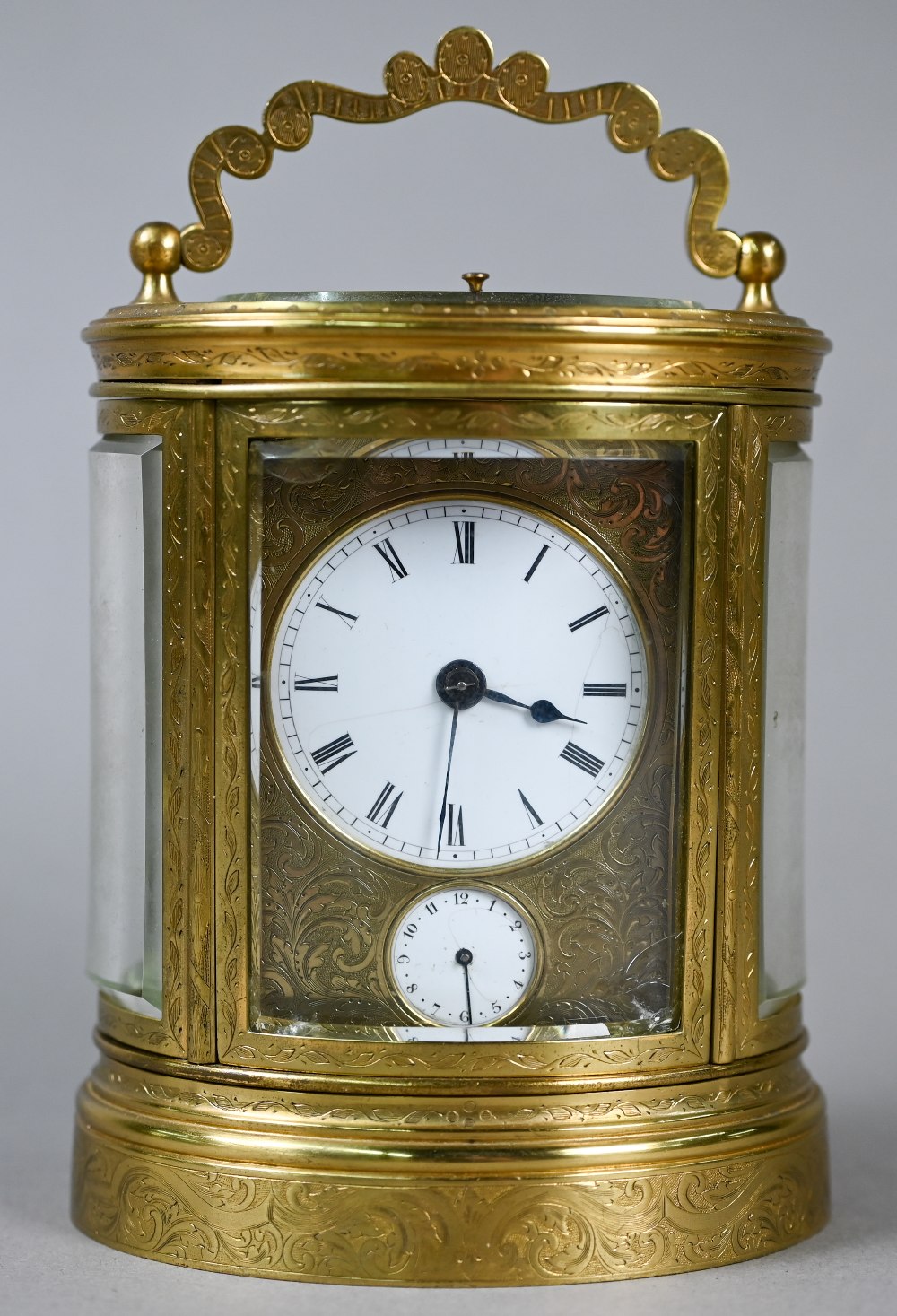 W H Tooke, Paris, an engraved oval brass alarm carriage clock, the two train movement no 1013 with - Image 2 of 7