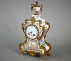 A French gilt metal mounted enamel panelled glazed porcelain rococo style clock, the twin drum 8-day