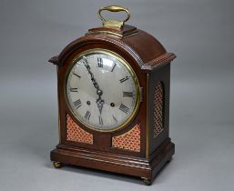 A Georgian style brass mounted mahogany bracket clock, the two train eight-day movement striking