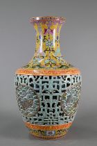 A Chinese yangcai double walled vase, the lotus scroll blue and white cylindrical inner vase