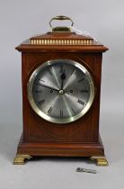 A continental late 19th/20th century brass mounted walnut cased eight-day bracket clock, the two