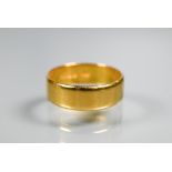 A 22ct yellow gold wide wedding band, size U, approx 6.3g