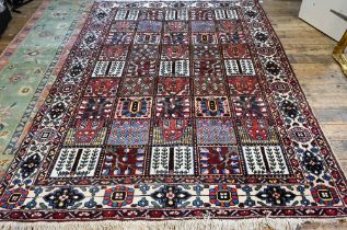A mid-century Persian Baktiari tile design carpet, 313 cm x 212 cm