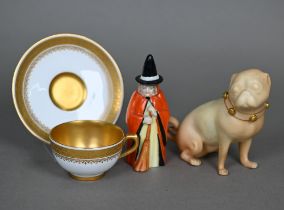 Royal Worcester: a blush ground pug with gilt collar, incised 'HS 1913', 1912, 9 cm, to/w a candle-