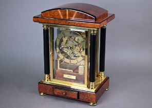 WITHDRAWN A contemporary Kieninger inlaid burr walnut four glass portico style mantel clock