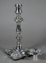 A Victorian pair of loaded silver candlesticks with Egyptian-style cluster columns on stepped square