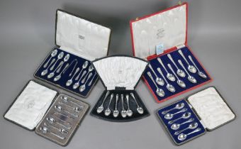 A cased set of twelve silver coffee spoons with tongs, Harrods 1927, to/w a cased set of six