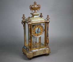 A late 19th century French cloisonné, gilt and onyx four glass mantle clock