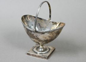 A late Victorian Adam Revival silver bonbon basket with swing loop handle and stemmed square foot,