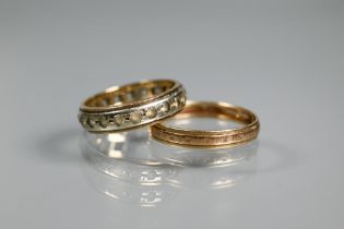 A stone-set full eternity ring, yellow metal stamped 9ct, approx 2.9g all in, size L to/w a yellow