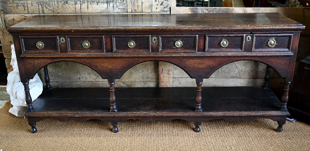 An antique oak low dresser with three double moulded front drawers over a triple arched apron, - Image 2 of 23
