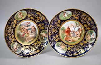A pair of Vienna cabinet dishes, the centres painted with mythological subjects, Athena giving