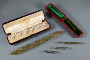 Three various bar brooches, two of plain form and one with running fox, a cased stick pin set