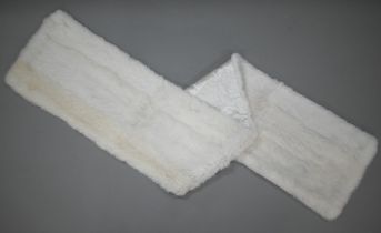 A vintage white ermine evening stole with cream satin lining, approx 175 cm long