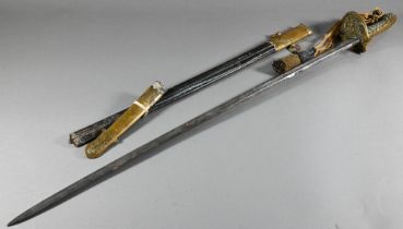 An antique Naval officer's sword, the 79.5 cm slightly curved blade with etched decoration, solid