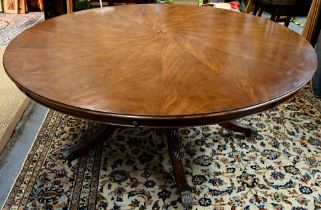 A large George IV style circular extending mahogany dining table by Arthur Brett model 2239 '