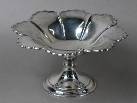 A silver comport of octofoil form, raised on a waisted stem, Atkin Bros, Sheffield 1903, 8.4oz, 19cm