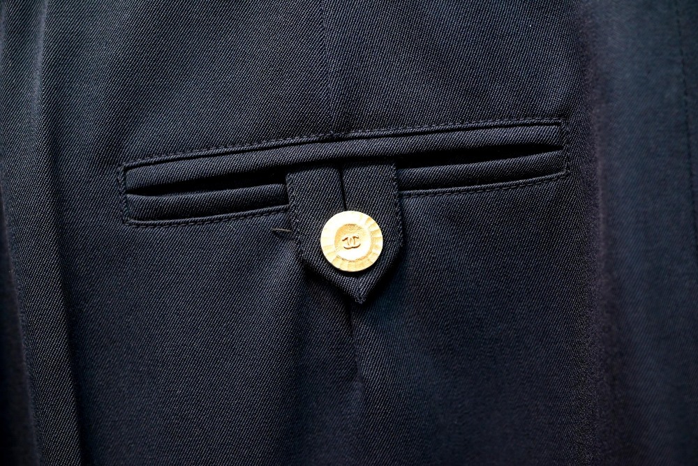 Chanel - A pair of navy trousers, with pleated front and gilt metal button detailing, fully lined, - Image 3 of 6