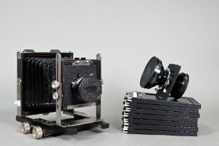 An Ebony RSW45 Ti large format field camera, serial number 116327, to/w a Schneider Kreuznach