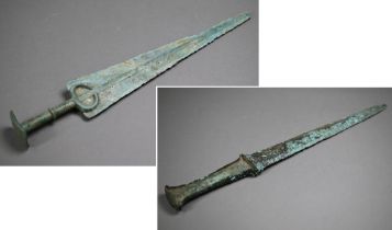 A Bronze Age short sword (possibly Marlik), the tapering blade with raised midrib, penannular