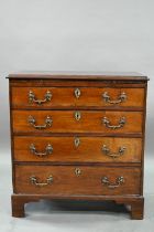 A George III mahogany caddy top chest, with full width slide over four long graduated and cock-