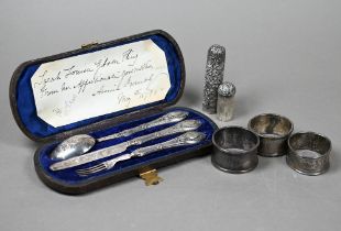 A cased Victorian silver Christening set with loaded handles and silver blades, James Collins,