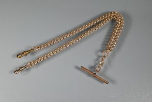 A 9ct yellow gold double Albert watch chain with bar and two gilt metal swivels attached, approx