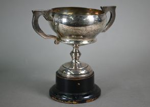 A silver two-handled trophy cup on stemmed foot, Roberts & Dore Ltd, Birmingham 1937, 10.9oz, 16cm