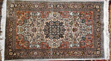 A vintage Kashan silk Kashan design rug, the cream ground centred by a medallion, 160 cm x 92 cm