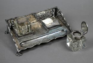 A Sheraton Revival silver inkstand with pierced three-quarter gallery, pen-trough and paw feet,