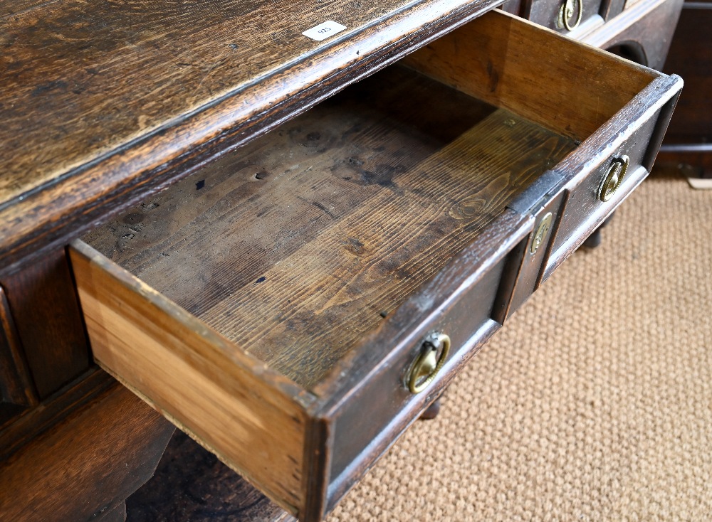 An antique oak low dresser with three double moulded front drawers over a triple arched apron, - Image 5 of 23