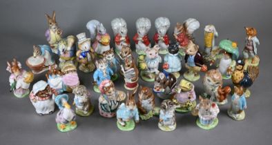 A collection of thirty-four Beswick Beatrix Potter figures with brown back stamps - seven boxed (34)