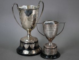 Two silver two-handled trophy cups on stemmed foot, Maker William Hutton & Son/Lee & Wigfull,