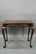 A Regency mahogany small serving table of Irish Chippendale style, the rectangular top with