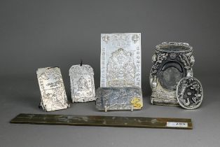 Four various Chinese/Tibetan white metal ingot plaques to/w a white metal inkstone/inkstand cast