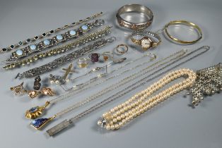 A collection of jewellery items including 9ct gold cross, gold cased wristwatch, 9ct signet ring,